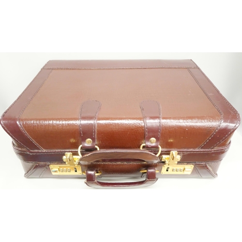 2117 - Two leather carry cases, one by Amano