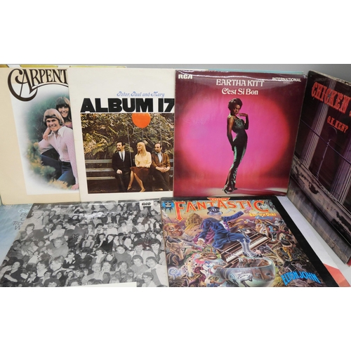 2120 - A collection of sixteen LP records including Elton John, Eartha Kitt, Elvis, Carpenters, Simon and G... 