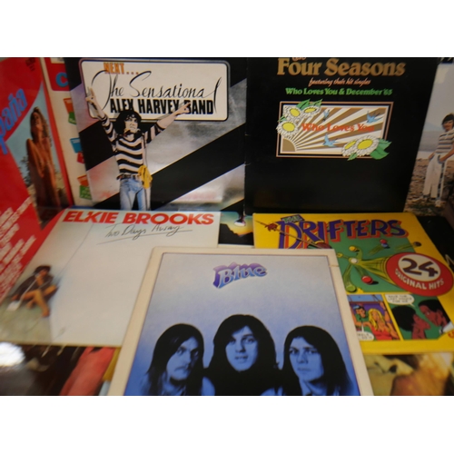 2130 - A collection of sixteen LP vinyl records including The Drifters, Four Seasons, Alex Harvey, Roxy Mus... 