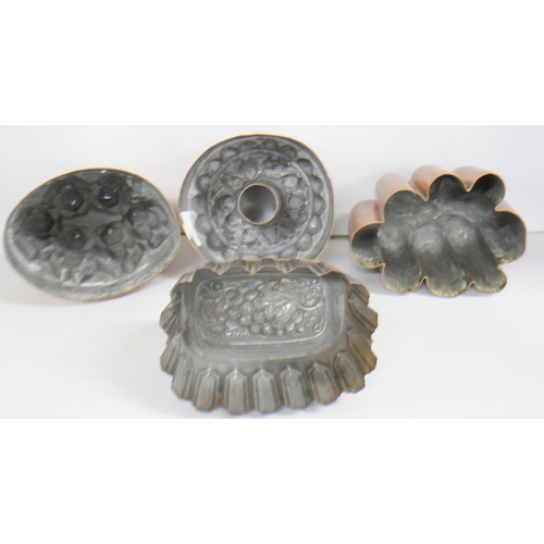 2132 - Four copper jelly moulds of various designs, two a/f. One Victorian example with grape design to top... 