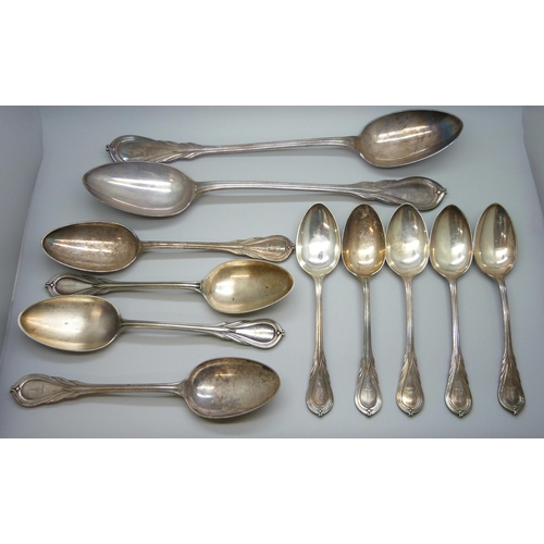 2145 - A part cutlery set with engraved family crest - 24 forks, 24 dessert forks, 2 serving spoons, 16 des... 