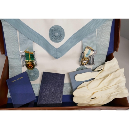 2146 - A case containing Masonic regalia, including two books: Emulation Ritual published 1976, and Constit... 