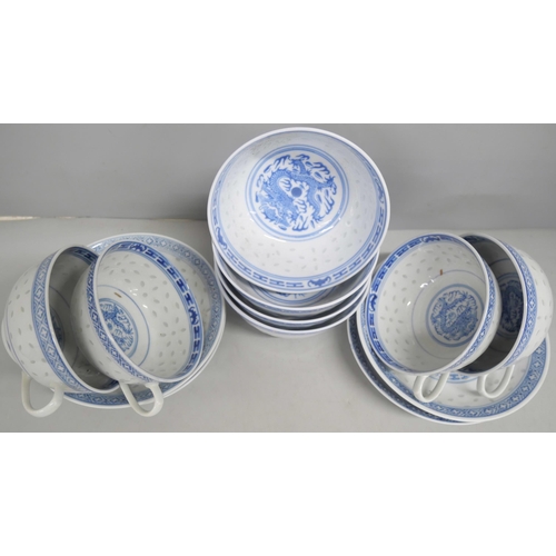 2155 - A large collection of Chinese blue and white bowls, cups and saucers (approximately 22 cups). Each w... 