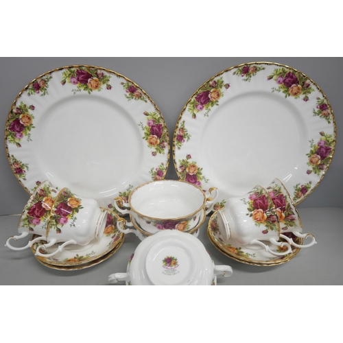 2158 - A bone china Royal Albert dinner service for six in the Old Country Roses pattern, including soup bo... 