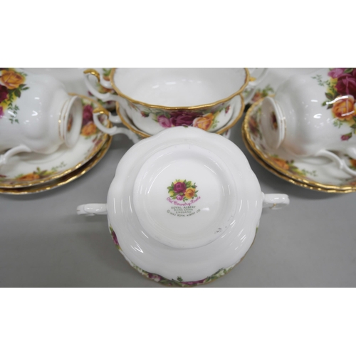 2158 - A bone china Royal Albert dinner service for six in the Old Country Roses pattern, including soup bo... 