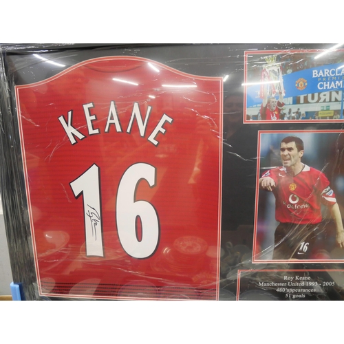 2160 - A Roy Keane Manchester United signed shirt and photograph display with COA to the back, framed