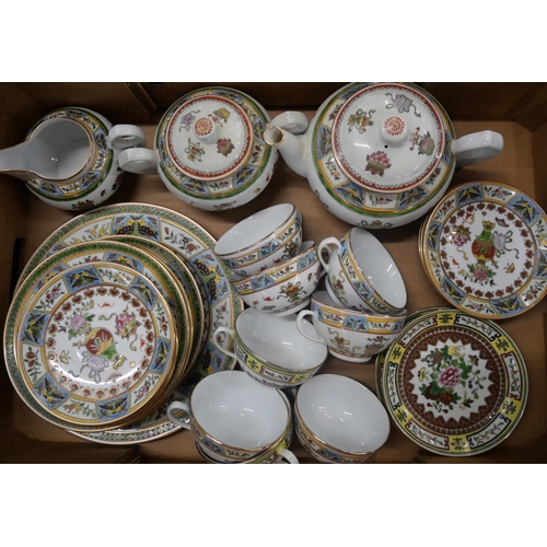 2161 - A Chinese porcelain tea service comprising of teapot, jug, teacups, saucers, small plates and one la... 