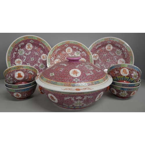 2163 - Two boxes of Chinese red dinnerware with famille rose design, comprising of two tureens, plates and ... 