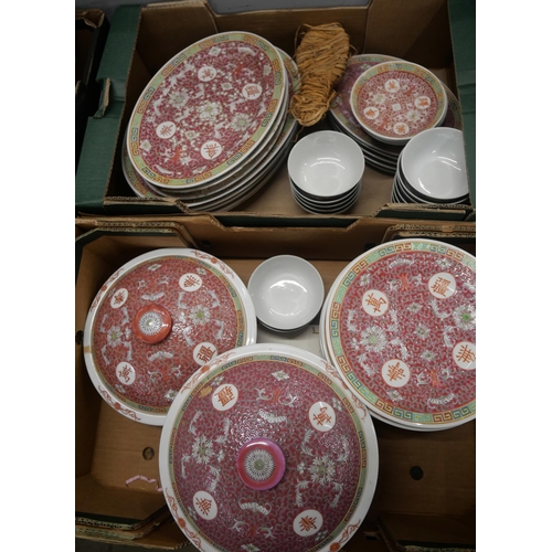 2163 - Two boxes of Chinese red dinnerware with famille rose design, comprising of two tureens, plates and ... 