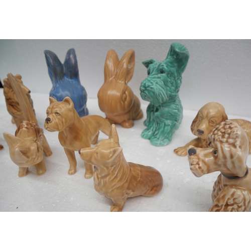 2167 - Collection of ten ceramic animal figures including Wade and Sylvac. Comprising of seven dogs, two ra... 