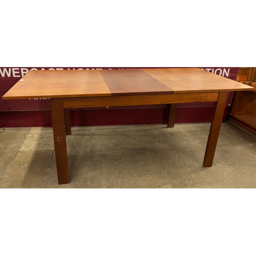 44 - A Danish Mogens Kold teak rectangular extending dining table and four chairs