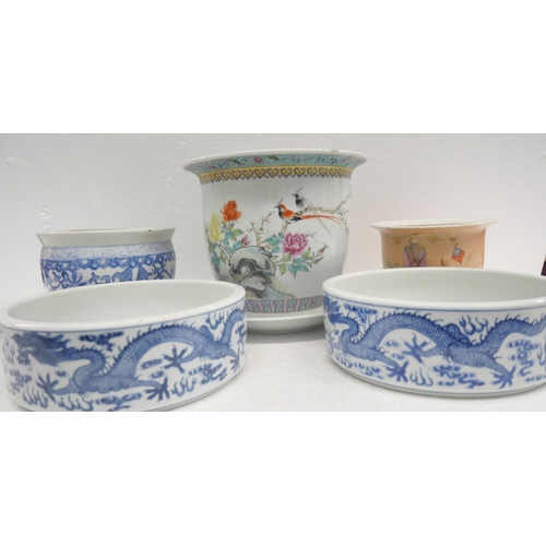 2252 - Three Chinese planters, one a/f, and a pair of blue and white circular bowls