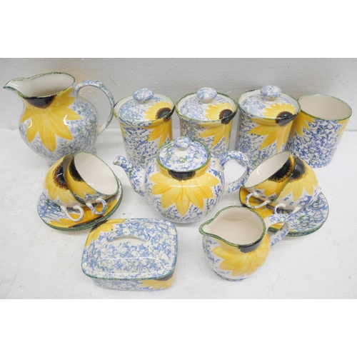 2260 - A collection of Poole pottery with yellow flower detail