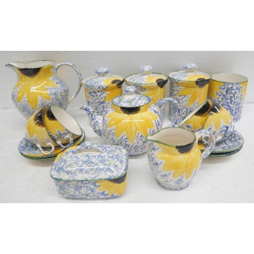 2260 - A collection of Poole pottery with yellow flower detail