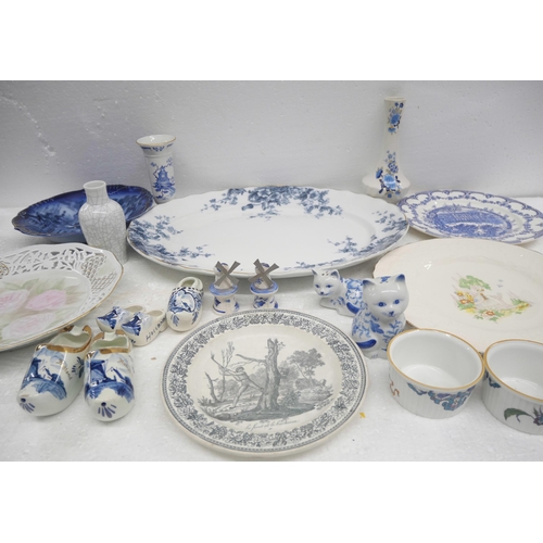 2262 - A collection of blue and white china to include a meat plate and Delft ornaments