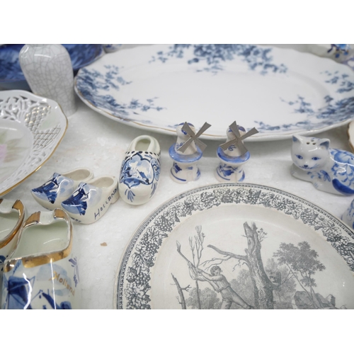 2262 - A collection of blue and white china to include a meat plate and Delft ornaments