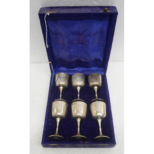 2265 - A Wade gold lustre six setting coffee set, a cased set of six plated goblets, three resin models of ... 