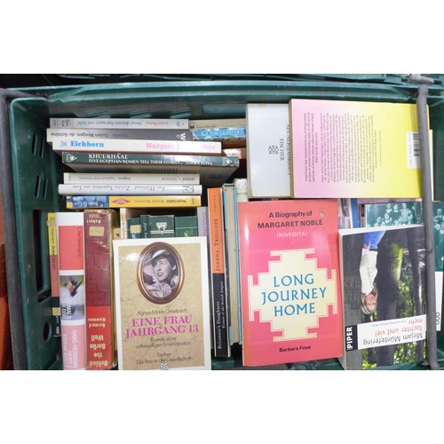 2266 - Eight boxes of assorted hardback and paperback books, a mix of German and English language, military... 