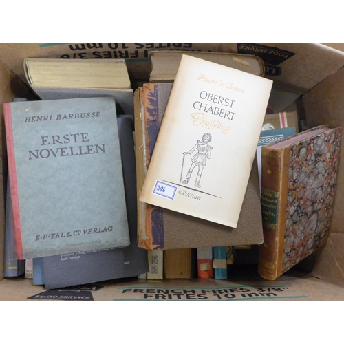 2267 - Nine boxes of assorted hardback and paperback books, a mix of German and English language, military ... 