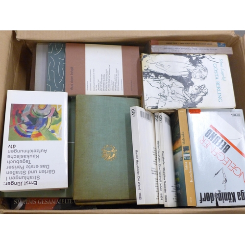 2267 - Nine boxes of assorted hardback and paperback books, a mix of German and English language, military ... 