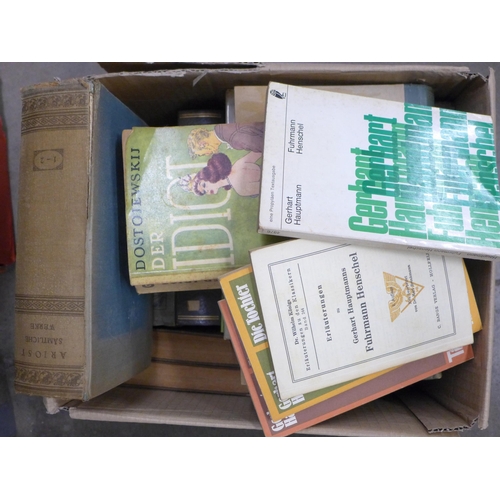 2268 - Seven boxes and two bags of assorted hardback and paperback books, a mix of German and English langu... 