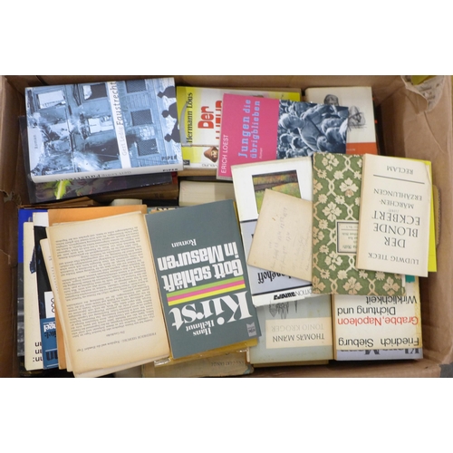 2268 - Seven boxes and two bags of assorted hardback and paperback books, a mix of German and English langu... 