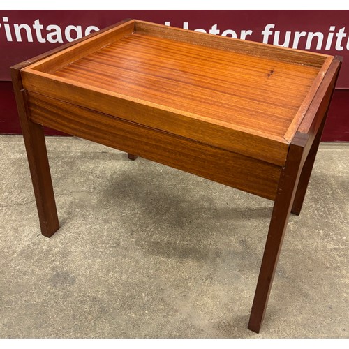 82 - A teak reversible top occasional table