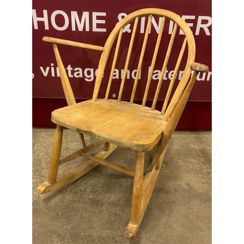 93B - An Ercol Blonde elm and beech childs rocking chair