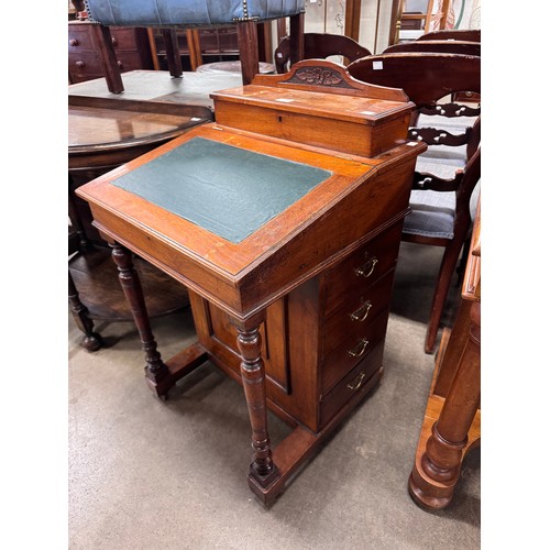 213 - A Victorian walnut Davenport