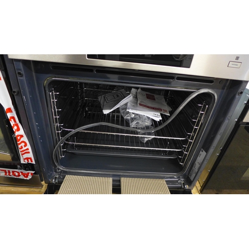 4051 - AEG multifunction oven (door requires attention) *This lot is subject to VAT