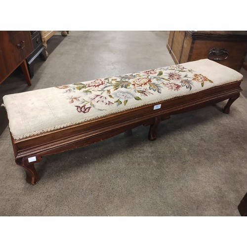 200 - An early 20th century mahogany footstool