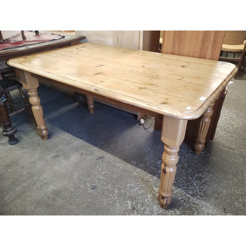 202 - A Victorian style pine kitchen table