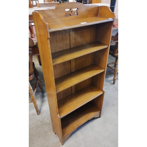 209 - An Arts and Crafts oak open bookcase