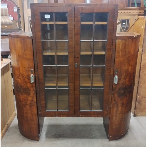 223 - An Art Deco walnut side by side bureau bookcase