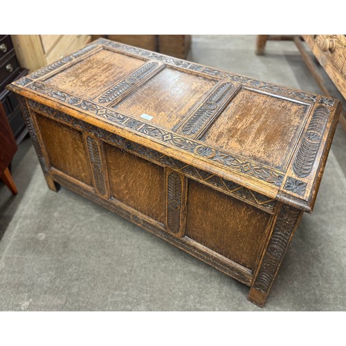 181 - A 17th Century style carved oak blanket box