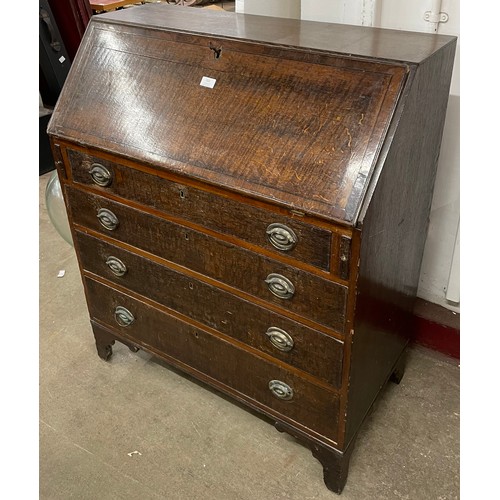 252 - A George II oak bureau