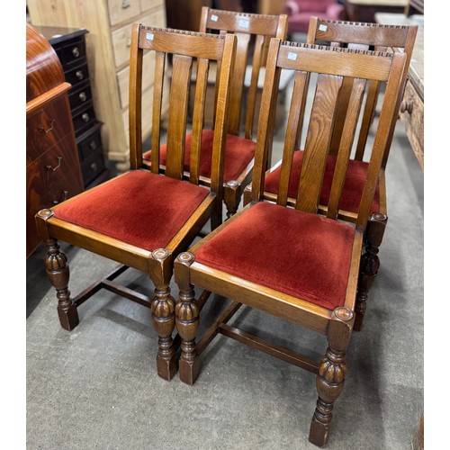 182 - A set of oak early 20th Century oak dining chairs