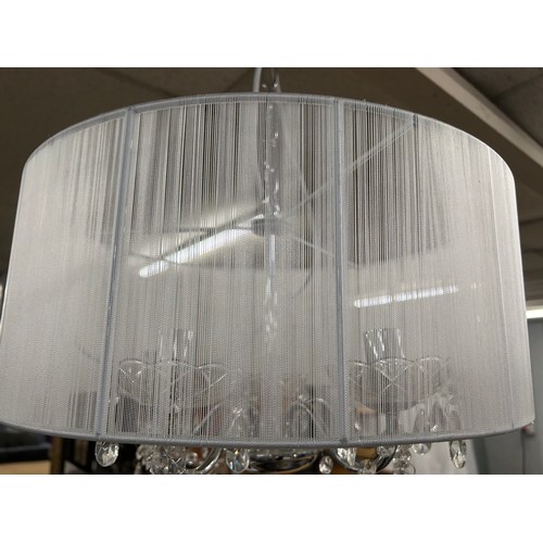 3186 - A chrome five arm chandelier