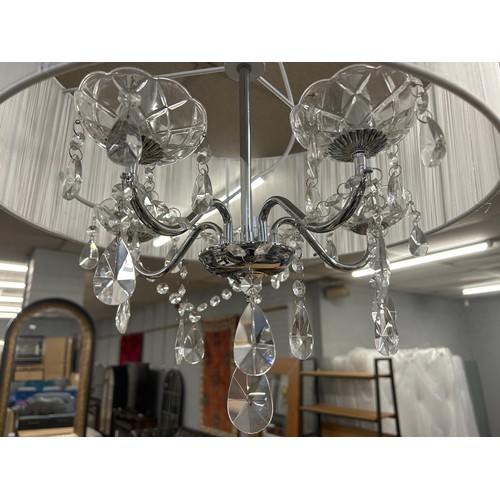 3186 - A chrome five arm chandelier