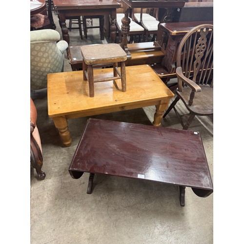 280 - A mahogany drop leaf coffee table, a stool and a pine coffee table