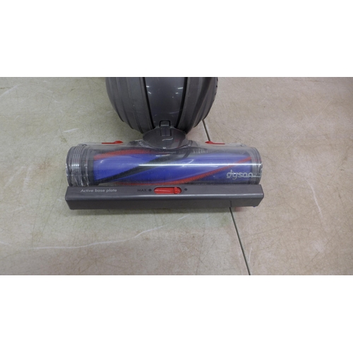 5146 - A Dyson small ball hoover with attachments and manuals