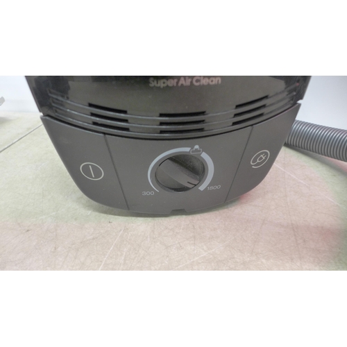 5148 - A Miele S571 super air clean hoover with spare bags