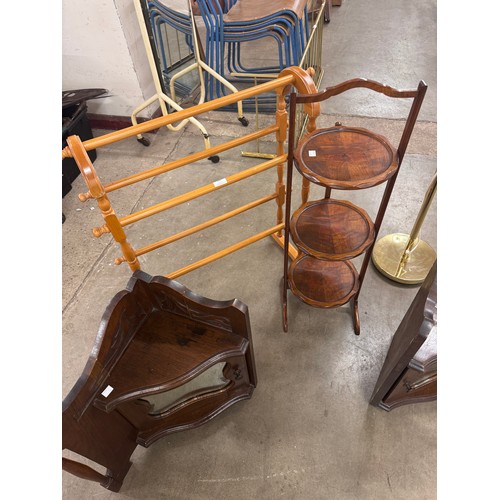 282 - An Edward VII mahogany folding cakestand, a brass standard lamp, beech towel rail and a pair of smal... 