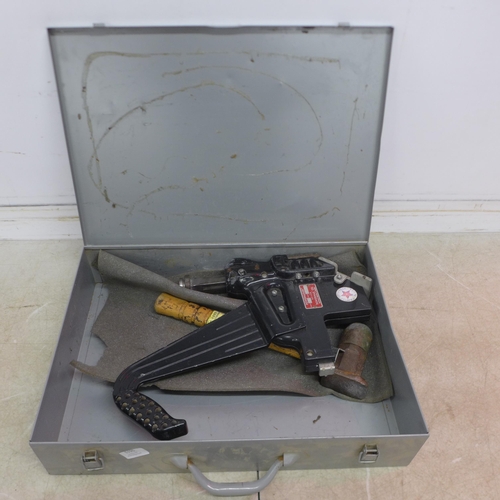 5195 - A cased Powernail Co manual power nailer/floor nailer and mallet