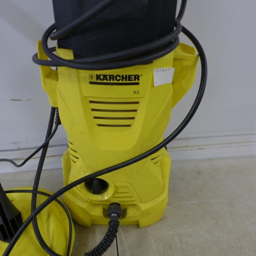 5206 - A Karcher K2 pressure washer with hose, lance and patio cleaner attachment