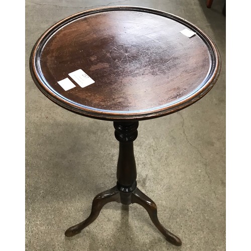 257 - A Regency style mahogany tripod wine table