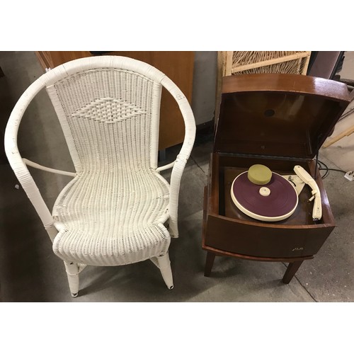 265 - A Pye walnut record player on stand and a wicker armchair