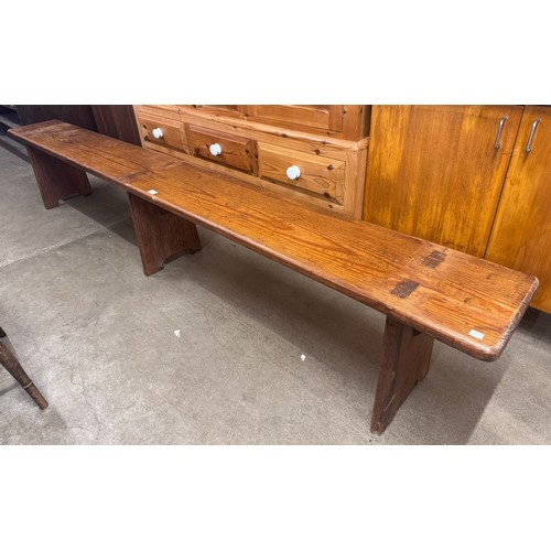 291 - An early 20th Century pine bench