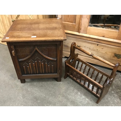 274 - A Gothic style oak pot cupboard and a beech magazine rack