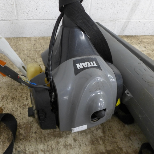 5210 - A Ryobi LWA110BE petrol blower vacuum with collector bag and a Titan TTL530GBC petrol strimmer